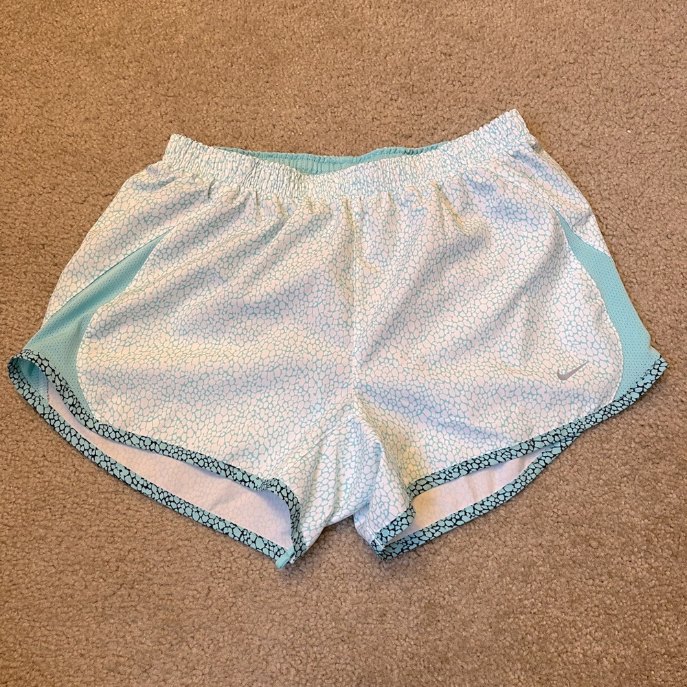 Nike teal patterned running shorts